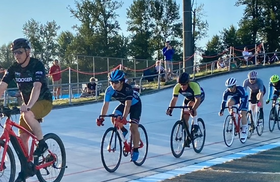 Riders following the pace motor bike prior to the Keirin Race